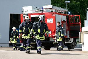 Bild: Das Tragen der kompletten Schutzausrüstung stellte bei den sommerlichen Temperaturen eine große körperliche Belastung dar