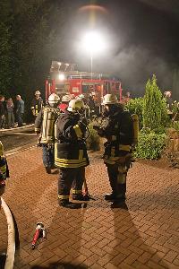 Bild: Ausgerüsteter Trupp unter Atemschutz