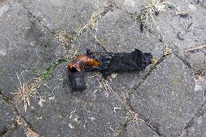 Bild: Teil des Schlauches, mit dem die Gasflasche am Grill angeschlossen war