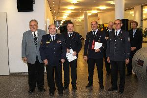 Bild: Landesstabführer Günter Schmitt ehrte Jörg Olliger, Markus Schmitt und Erich Daub anlässlich ihrer langjährigen Mitgliedschaft im Fanfarenzug der Feuerwehr