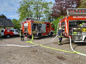 Bild: Maschinisten an den Löschfahrzeugen