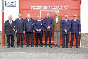 Bild: Von links: 1. Beigeordneter Berthold Schmitt, Leiter Bürgerdienste Leo Peter, Kreisbrandinspekteur Werner Thom, Heino Molter, Markus Lambert, Ortsvorsteher Manfred Klein, Bernd Detzler, stellvertretender Wehrführer Christian Holz