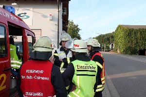 Bild: Lagebesprechung am Einsatzleitwagen